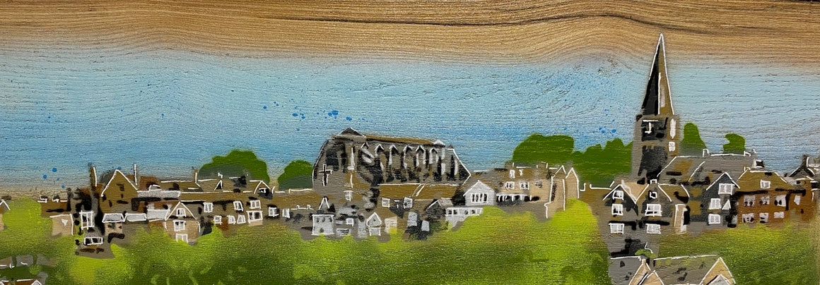 Malmesbury town skyline landscape with Abbey and rooftops 